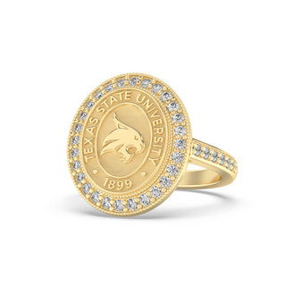 Yellow Gold graduation class ring with Texas State University emblem and white stones on a white background