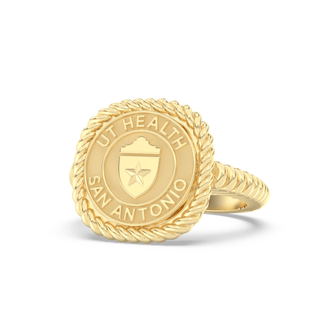 Gold class ring with 'UT Health San Antonio' engraving on a white background