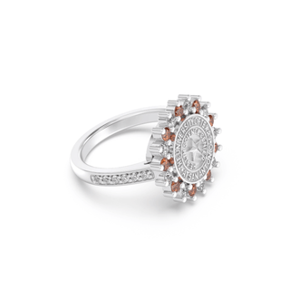 Silver class ring with a university of texas san antonio health science center seal and small orange and white stones on a white background