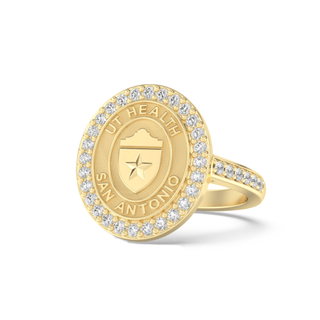 Gold class ring with 'UT Health San Antonio' shield seal on a white background