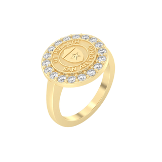Gold class ring with 'UT Health San Antonio' seal and white stones on a white background