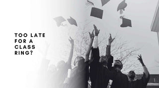 College graduates celebrating in caps and gowns before ordering class rings