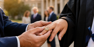 What is a college class ring ceremony? College student receiving a university class ring during a ring ceremony