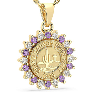 GCU Necklace | Grand Canyon University Graduation Pendant | Gold pendant with Grand Canyon University emblem and purple and white stones on a white background