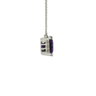 Necklace with a amethyst gemstone pendant on a white background