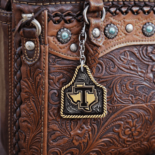 tarleton state university cattle tag key chain on western purse
