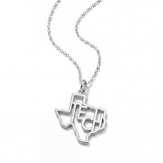 A silver necklace featuring a pendant shaped like the state of Texas, with the letters 'T', 'E', and 'C' cut out in the center, displayed on a clean white background.