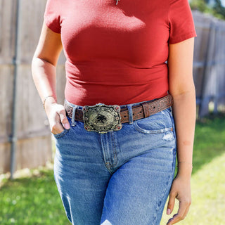 Person wearing a Texas State belt buckle