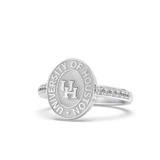 Silver graduation class ring with 'University of Houston' and UH on silver seal on a white background