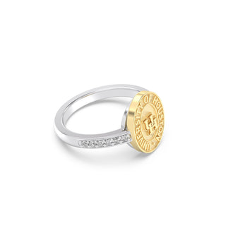 Silver graduation class ring with 'University of Houston' and UH on yellow gold seal  on a white background