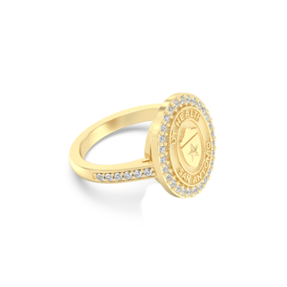 Gold university of texas health science center san antonio class ring with white stones on a white background