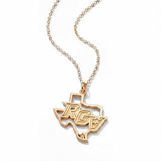 A yellow gold necklace featuring a pendant shaped like the state of Texas, with the letters 'RGV' and a star cut out in the center, displayed on a clean white background.