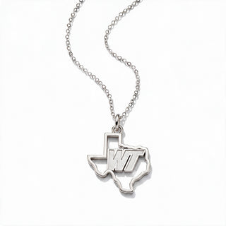 A silver necklace featuring a pendant shaped like the state of Texas, with the letters 'WT' engraved in the center, suspended from a delicate silver chain on a white background.