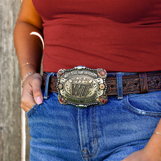 Person wearing a belt with a West Texas A&M University buckle.